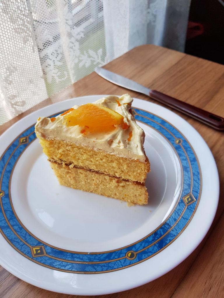 Double layer orange cake slice